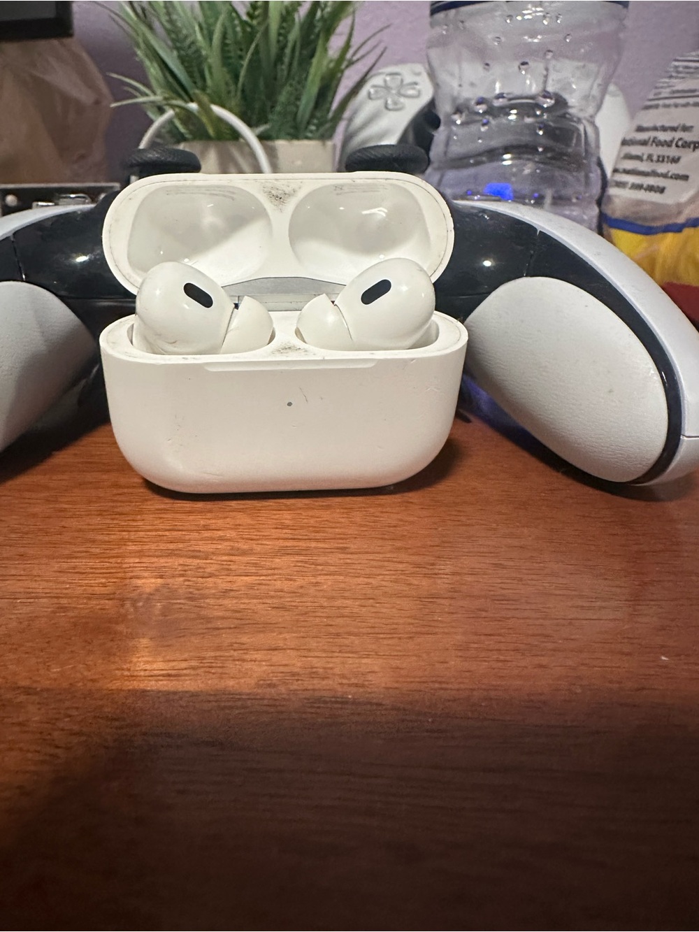Apple AirPods Pro Charging Case with White Earbuds